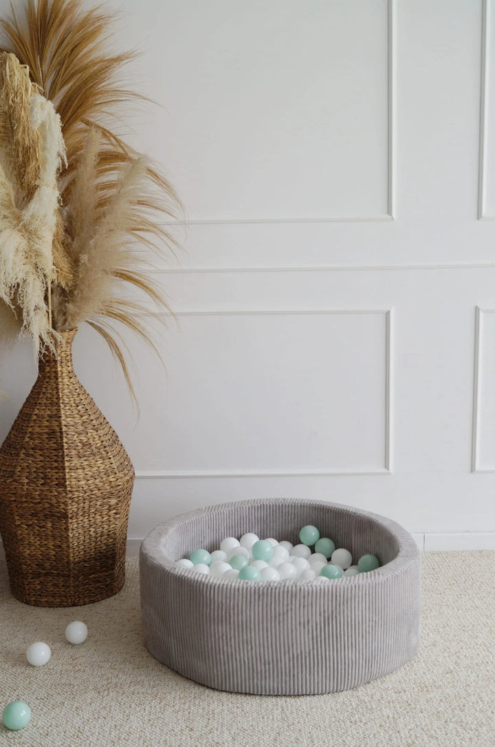Monio for Kids Grey Corduroy Round Ball Pit — lifestyle image showing ball pit from above
