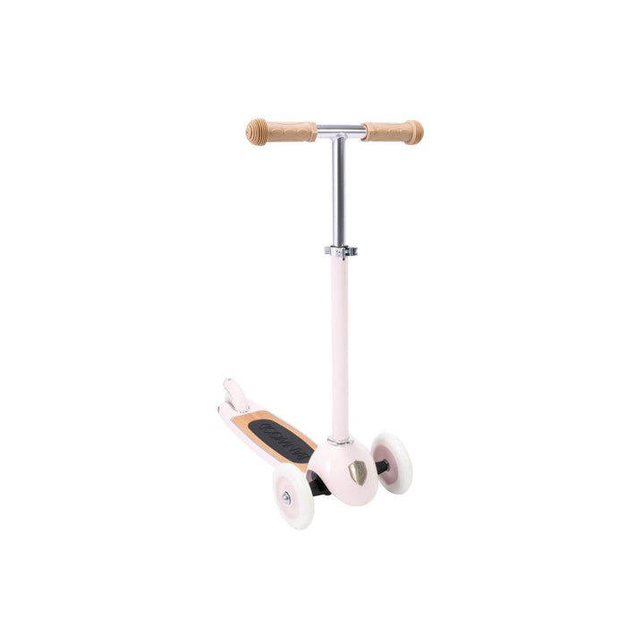 Close-up of scooter handlebar showing wooden grips with vintage-style rubber texture