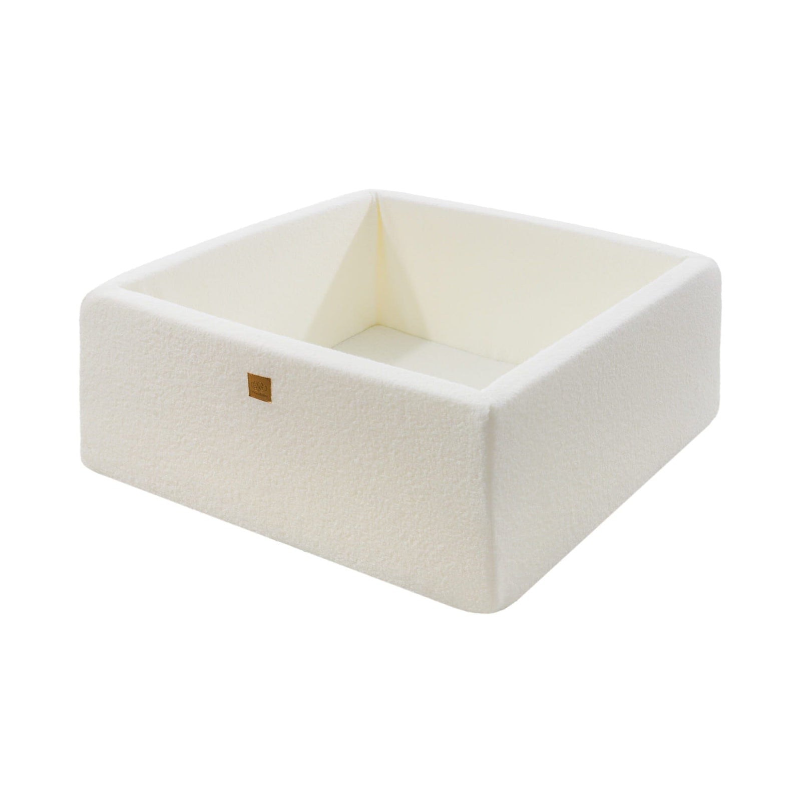 Empty cream boucle square ball pit, interior view with fold detail