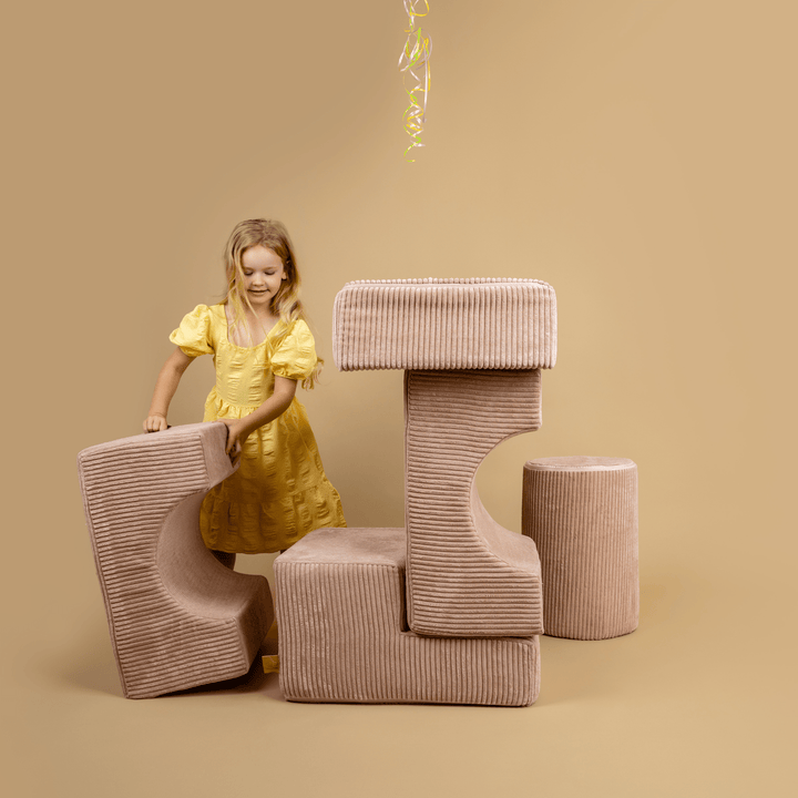 Child building freely with the MeowBaby Aesthetic Shape Set foam pieces