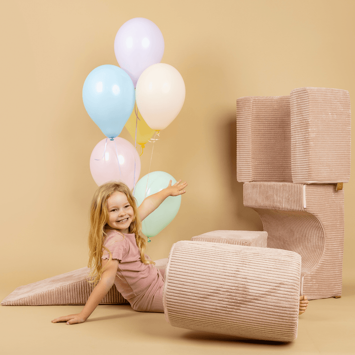 Child playing on the 4-Element MeowBaby Aesthetic Shape Set with balloons nearby
