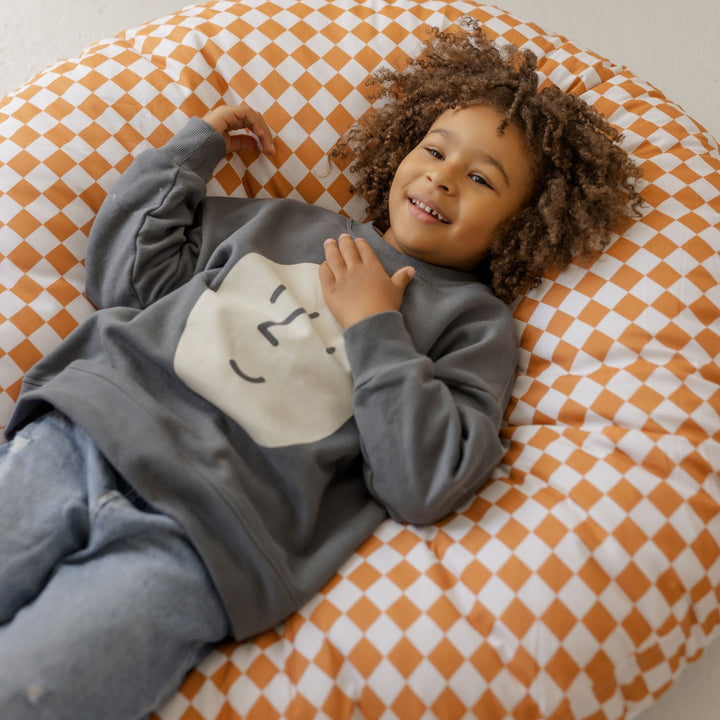 MINICAMP checkered floor cushion, angled view