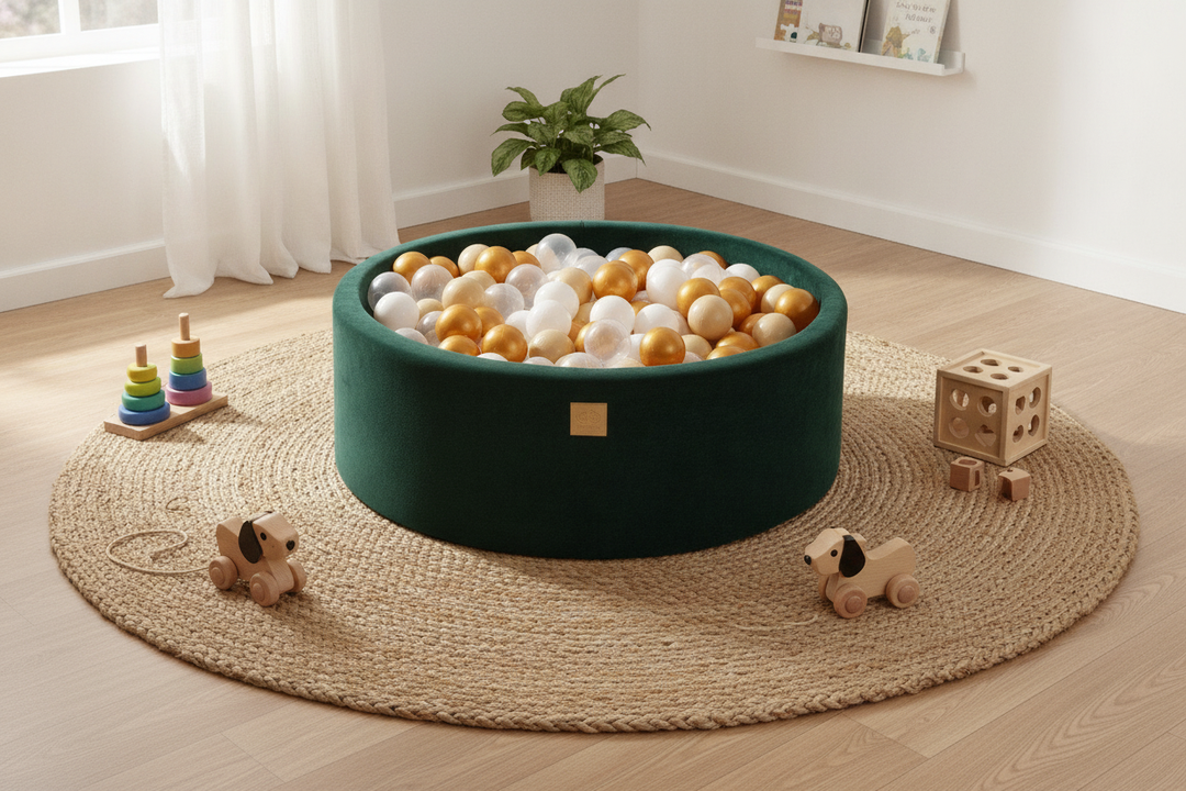MeowBaby Dark Green Round Velvet Ball Pit on a rug in a bright playroom