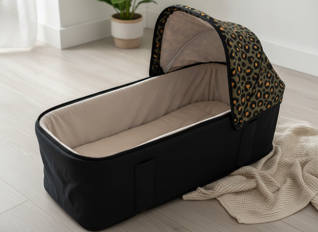 Roma Gemini 2 Carry Cot in Khaki Leopard showing the extendable hood and cushioned interior