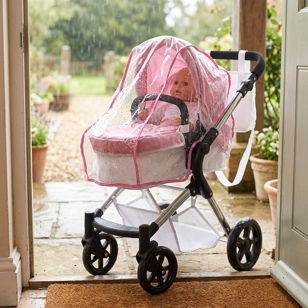 Close-up of the clear PVC rain cover fitted over a Roma dolls pram seat unit, doll visible through the clear plastic