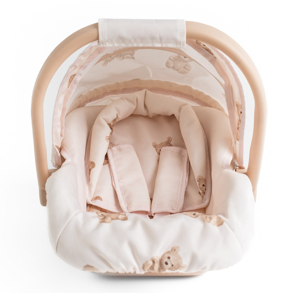 Inside the Roma Teddy Dolls Car Seat showing the padded head hugger and 3-point harness straps