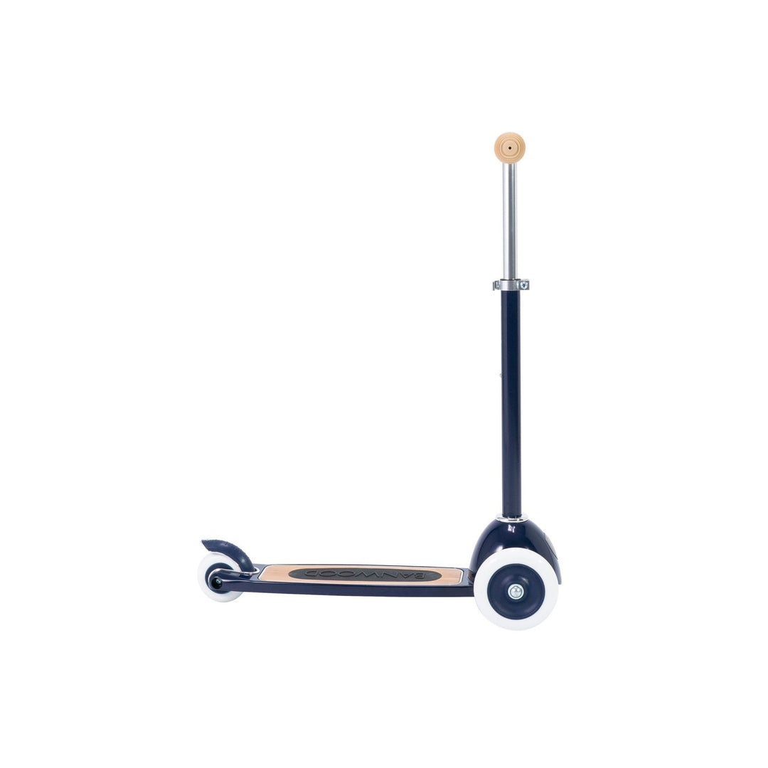 Close-up of scooter front wheel with white tyre and blue housing detail