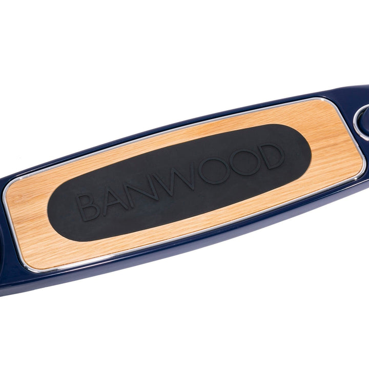 Scooter deck detail with wooden inlay and Banwood logo