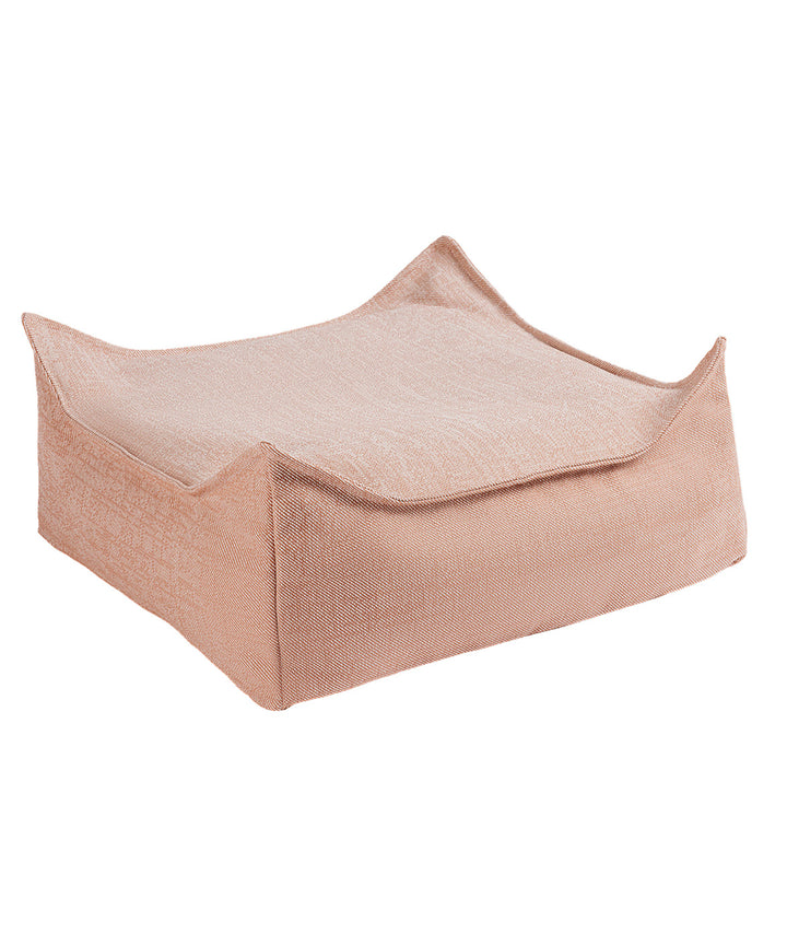Dusty rose Wigiwama outdoor square ottoman with ribbed fabric texture, three-quarter view