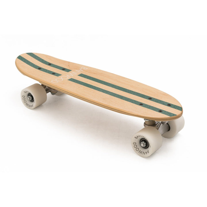 Group of friends gathered around Banwood skateboard on concrete ground