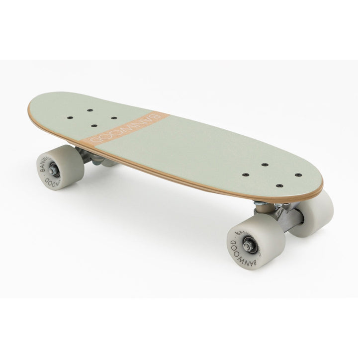 Banwood mint skateboard at three-quarter angle with white wheels