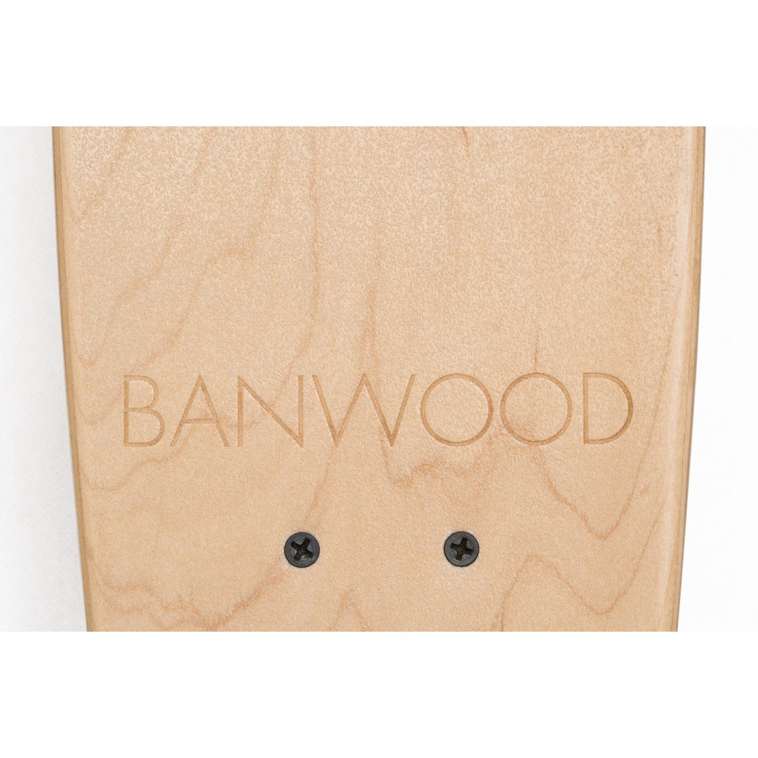 Banwood skateboard deck surface with engraved branding and mounting holes