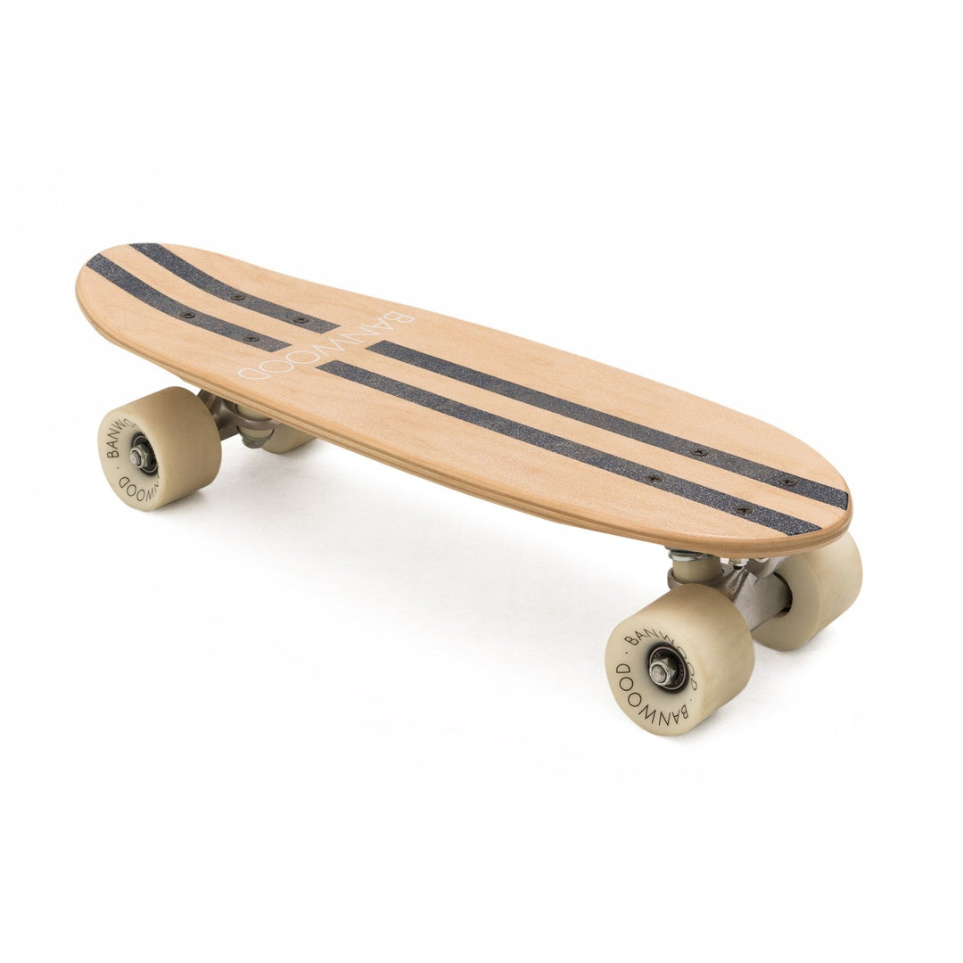 Three-quarter angle Banwood skateboard with cream wheels on white background