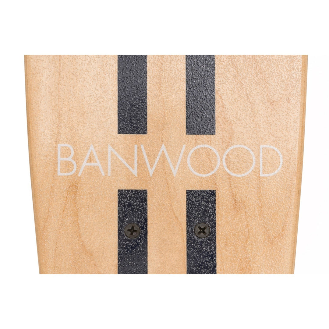 Banwood skateboard deck flat lay showing wood texture and grip tape detail