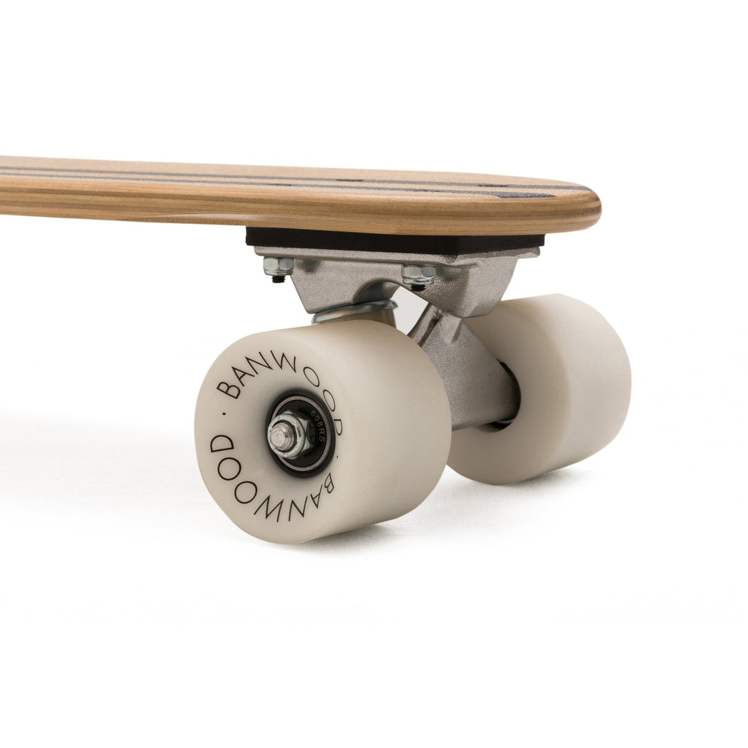 Banwood skateboard rear truck closeup with cream wheel and chrome bearing