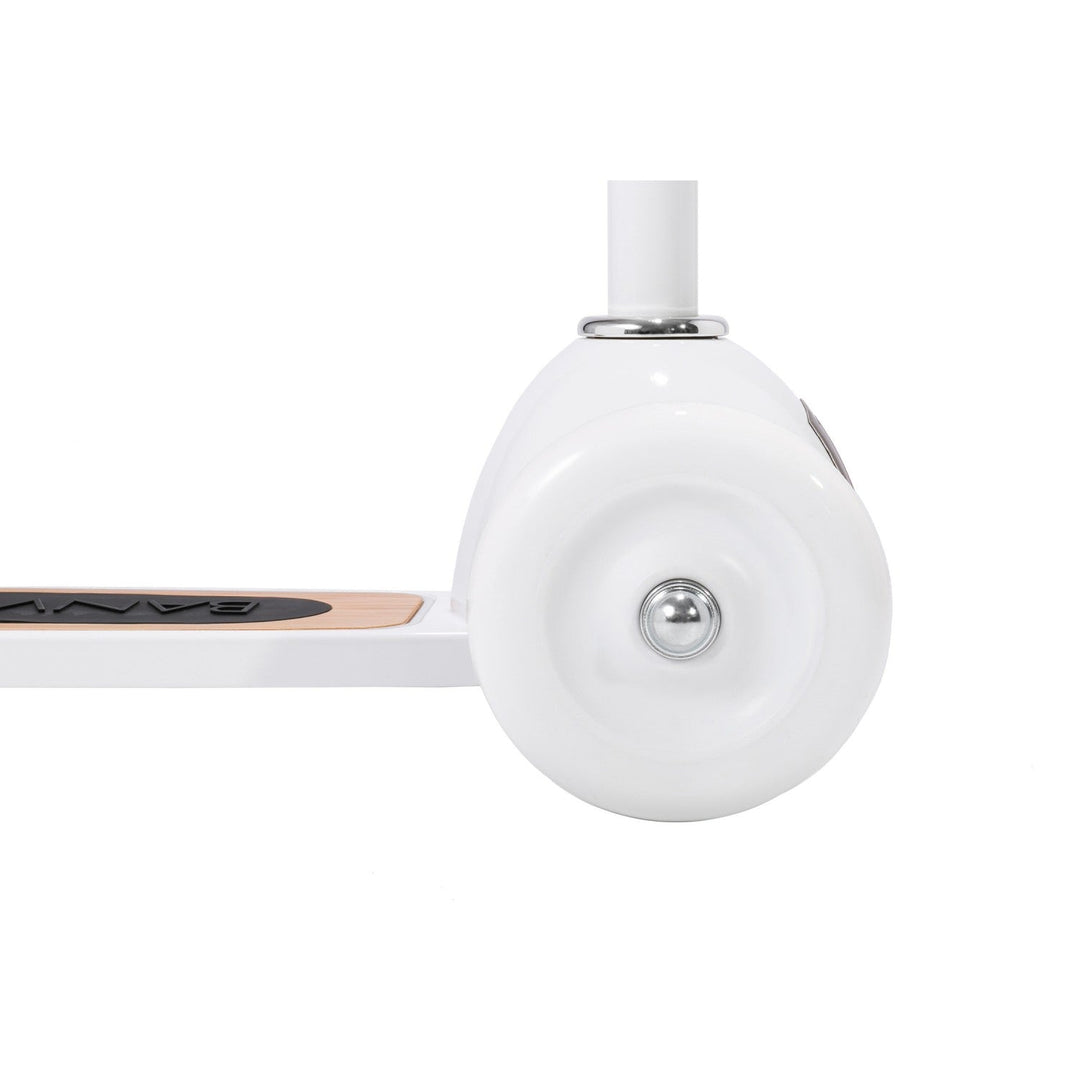 Rear wheel close-up showing spherical white wheel and metal mounting