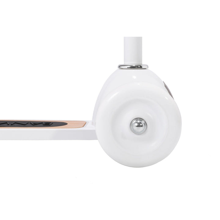 Rear wheel close-up showing spherical white wheel and metal mounting