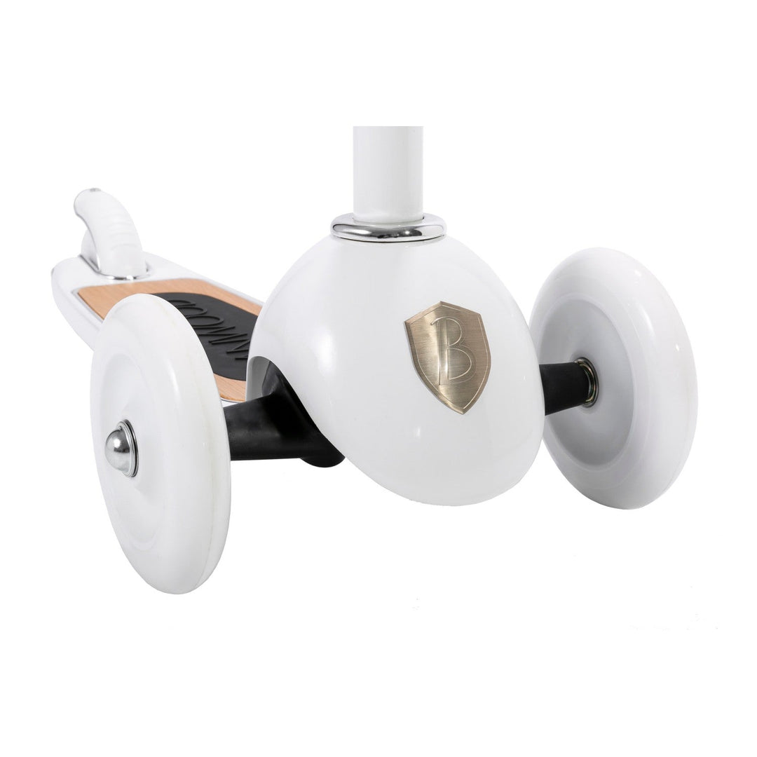 Scooter underside detail showing three white wheels and metal axle assembly