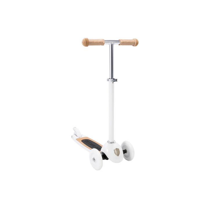 White scooter angled view showing front wheel positioning and deck